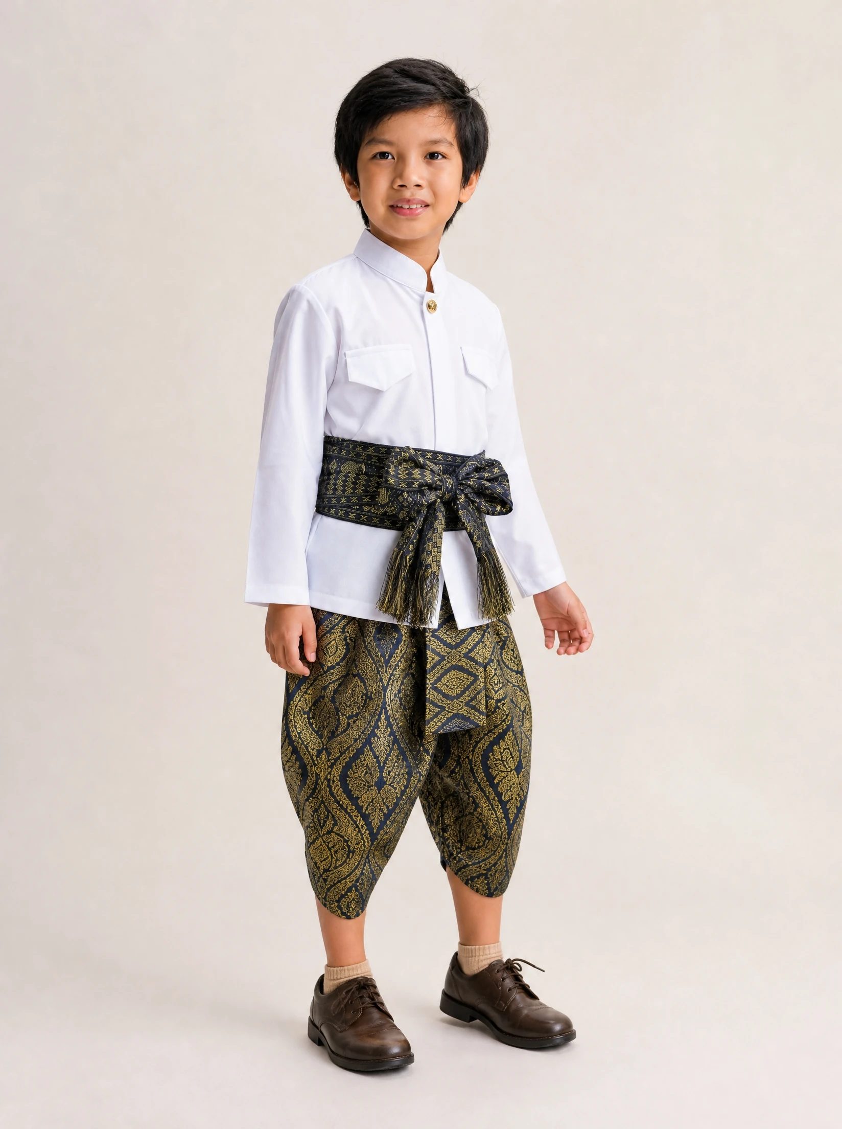 Nawin boys' Thai outfit in navy, turn view