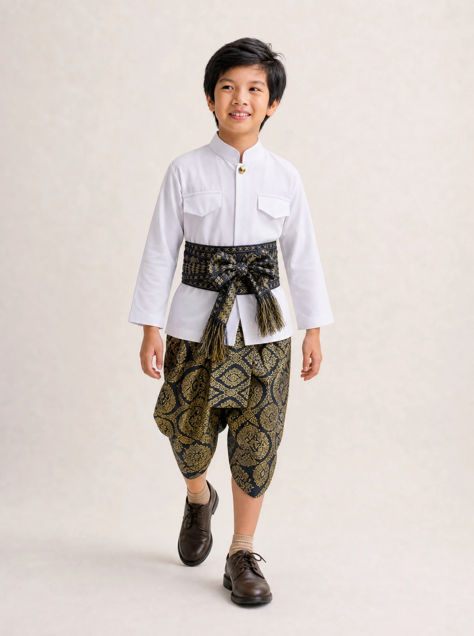 Nawin boys' Thai outfit in navy, walking view
